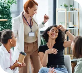 Group of women participating and enjoying a therapy session together