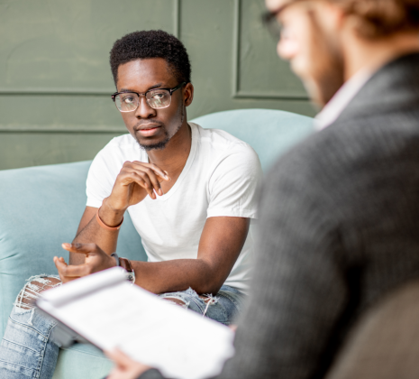 two adult man talking