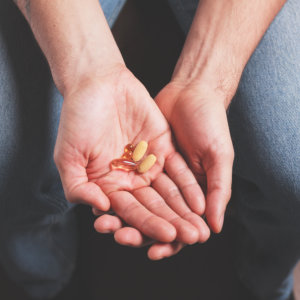 pills in the humans hand