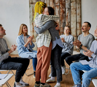 two person hugging each other
