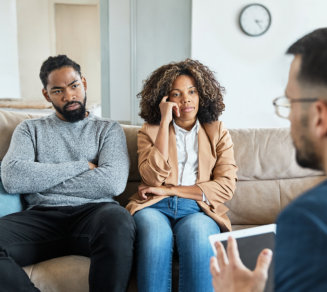 couple talking with the staff